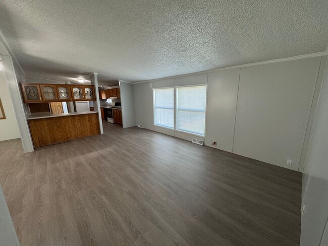 Building Photo - Very large yard great location a nice older doublewide Home