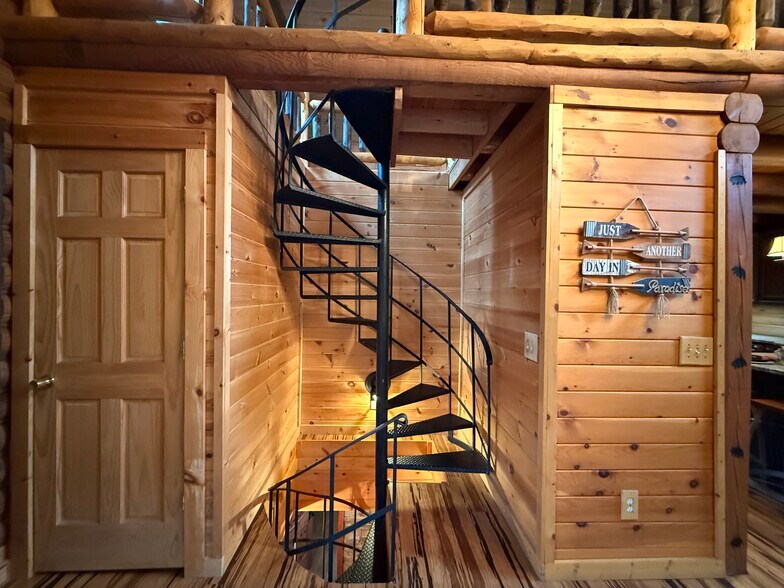 Spiral staircase to the loft and basement living - 1011 Lake Shore Dr