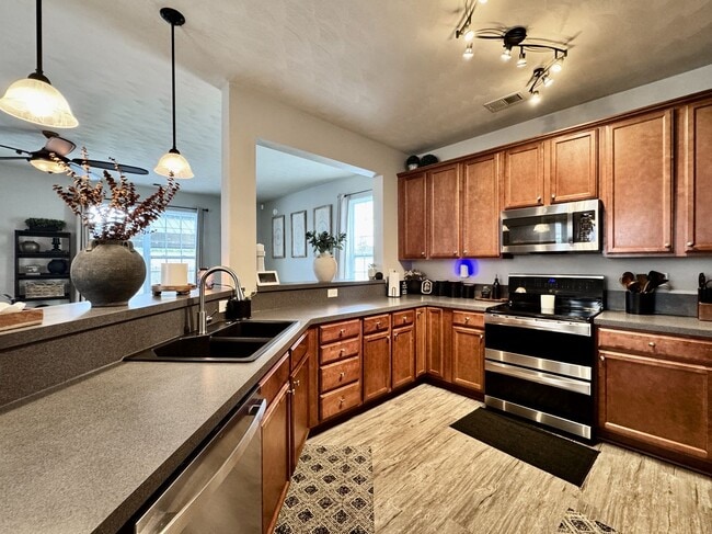 Building Photo - First-Time Rental, Available July 1st! Attached Garage - 2 Primary Suites - Pet-Friendly (Under 4...