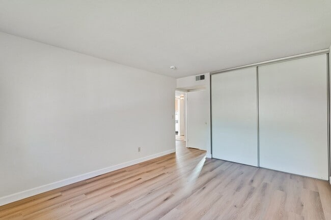 Building Photo - New Vinyl Plank Flooring, Fresh Interior Paint, 1 Car Garage + 1 Assigned Outdoor Parking Space -...