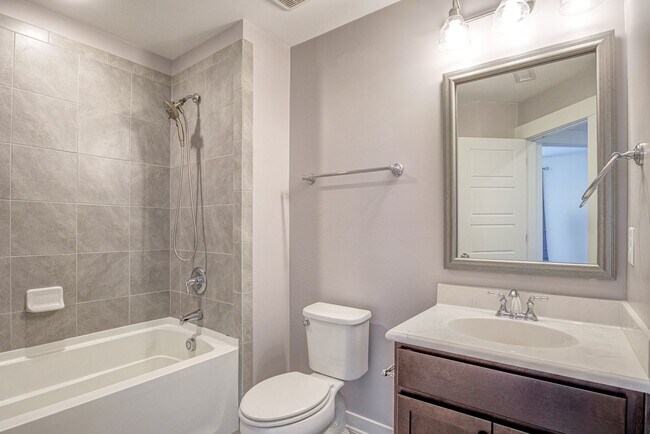 Building Photo - Corner Townhome with Roof Top Deck in Down...