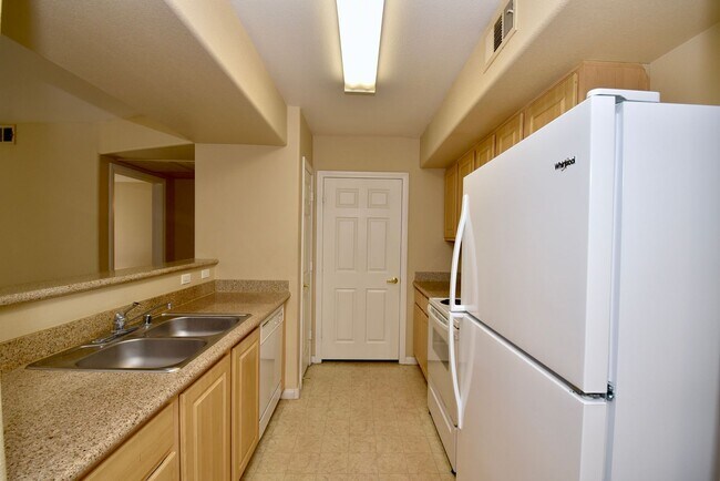 Building Photo - Cozy 1 Bedroom Condo 2nd Floor At Coronado...