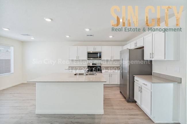 Building Photo - "Charming 4-Bed Oasis on La Cura Avenue: Spacious Living with 2.5 Baths in Vibrant Las Vegas!"