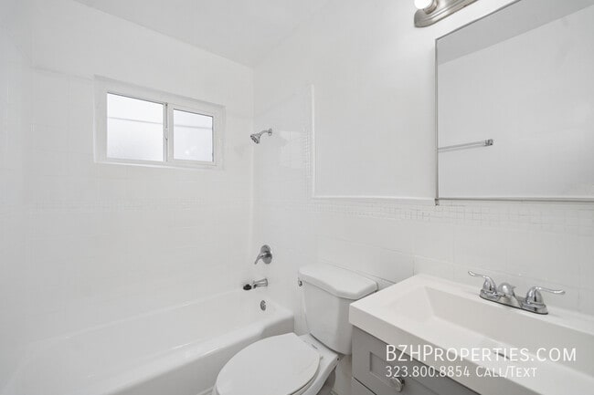 Building Photo - 7209 Willoughby Ave