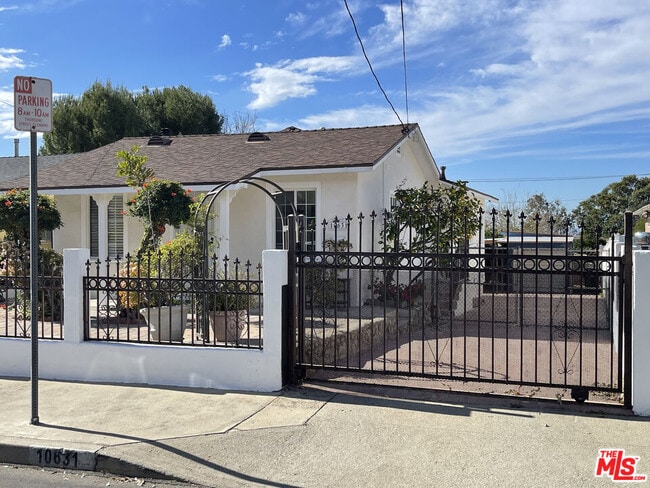 Building Photo - 10631 Tinker Ave