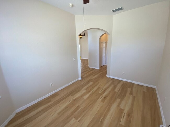 Building Photo - ANNUAL Lease – Unfurnished – Golf Course Lot - Designer Home in the highly sought-after gated com...