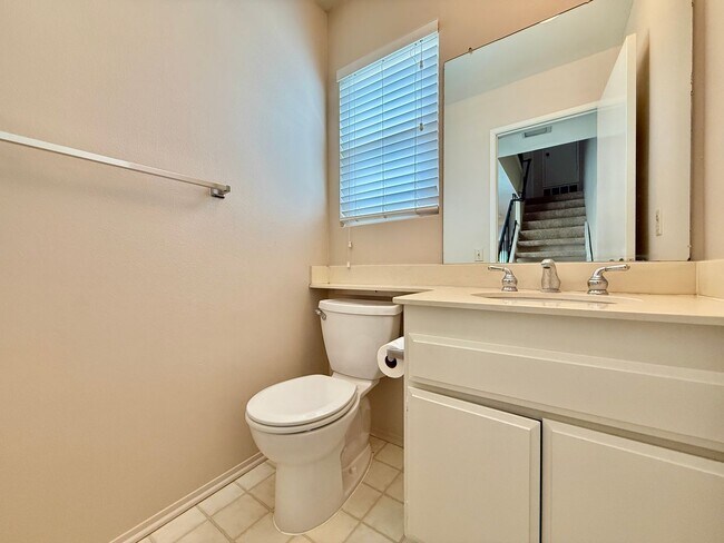 Building Photo - Move in Ready! 2BD Townhome! New Carpet! Two Patio Spaces! Attached Garage!