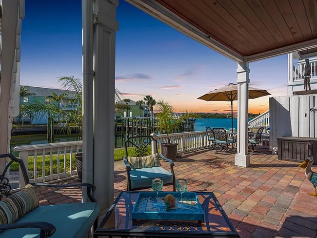 Building Photo - Stunning 2/1 available now at Waterside at Coqunia Key!