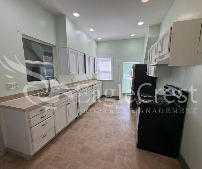 Building Photo - Charming Historic 4-Bedroom Home with Fenced Yard & Chicken Coop