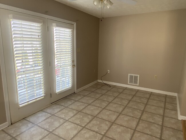 Sunroom entry to patio - 110 Ladderback Ct