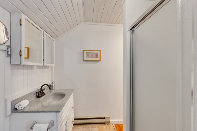 Upstairs bathroom and shower. - 717 E Lakeside Ave