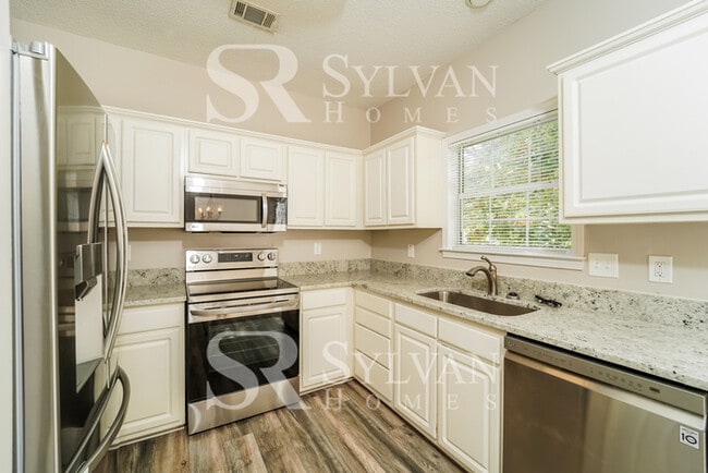 Building Photo - Lease today! No extra charge for contentment and relaxation!