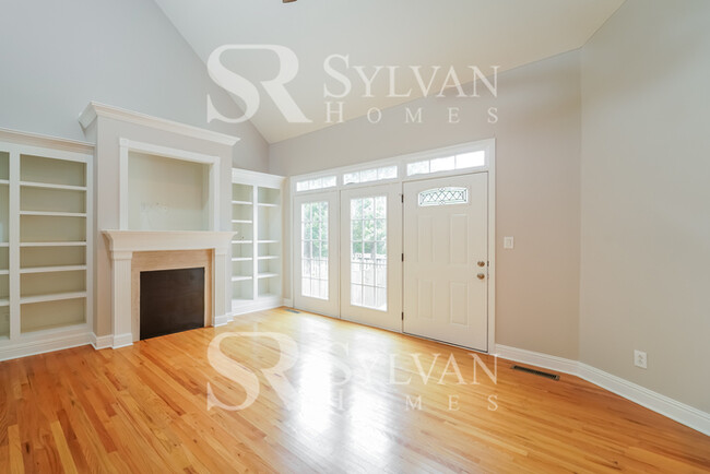 Building Photo - Welcome to this charming abode.