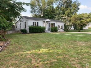 Building Photo - Spacious Four-Bedroom Home with Loft and P...