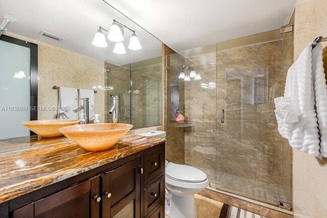 Building Photo - 19999 E Country Club Dr