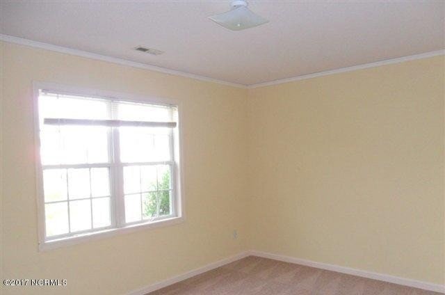 Building Photo - "Cozy Coastal Living: Charming 2-Bed, 2-Ba...