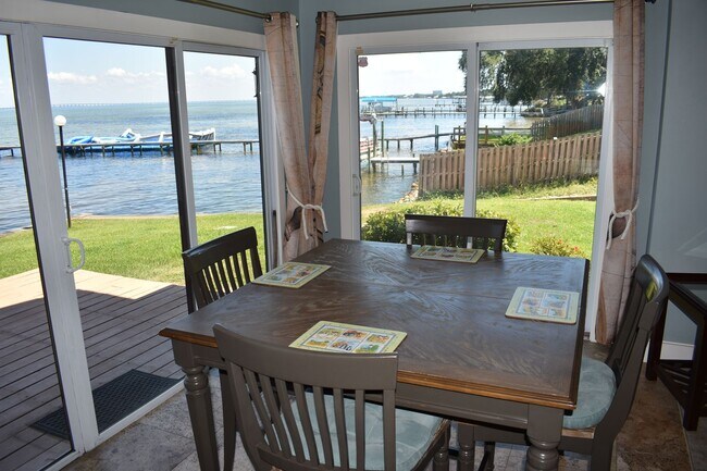 Building Photo - Waterfront Paradise - Fully Furnished Townhome - All Utilities Included