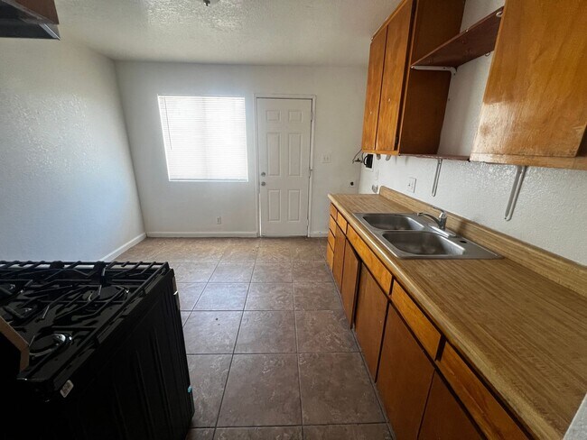 Building Photo - 6589 Palo Verde Ave