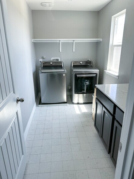 Laundry room upstairs - 10111 Hickory Crk