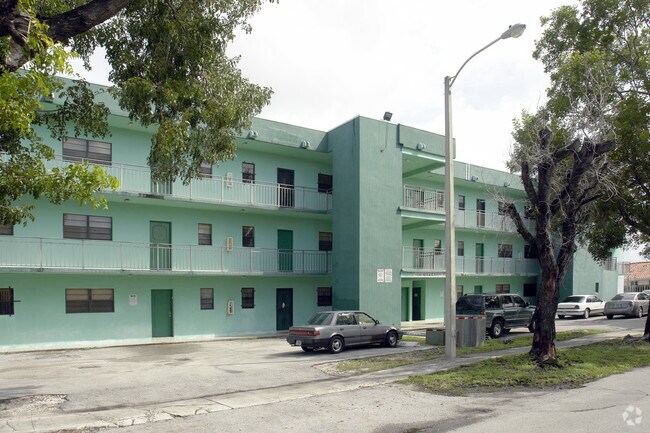 Building Photo - Paradise Properties