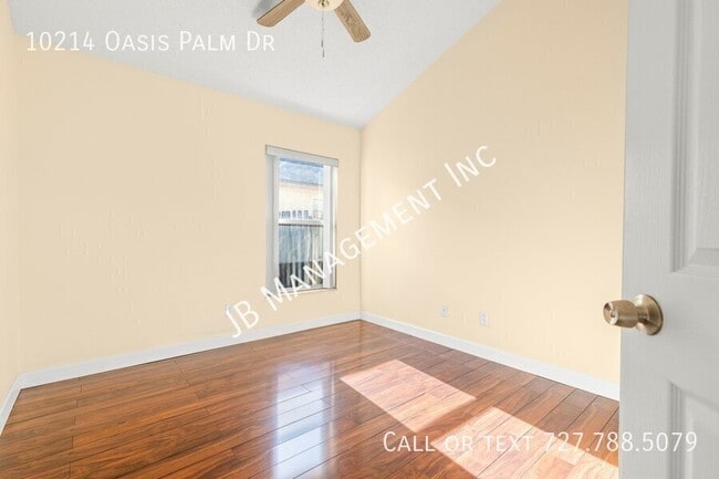 Building Photo - 10214 Oasis Palm Dr