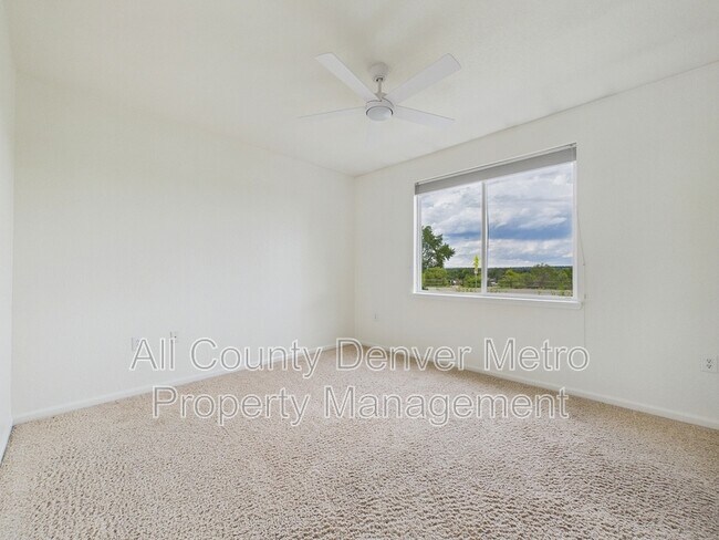 Building Photo - 10239 W 55th Dr