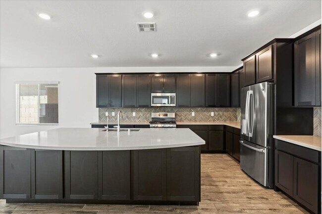 Building Photo - Spacious 5-bedroom home in gated community