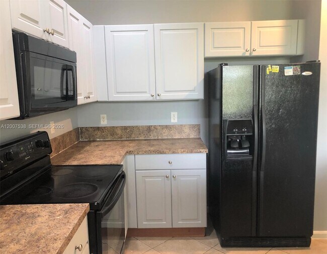 Building Photo - 8209 SW 25th Ct