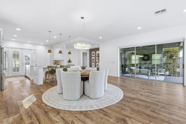 Building Photo - Luxury 5-Bedroom Residence in Eagle Creek with Indoor-Outdoor Living