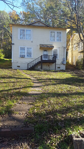 Entrance to Unit B of Duplex. Duplex is a 2 story property. Unit B is on the lower floor, and has a rear access entry. - 7128 4th AV, S