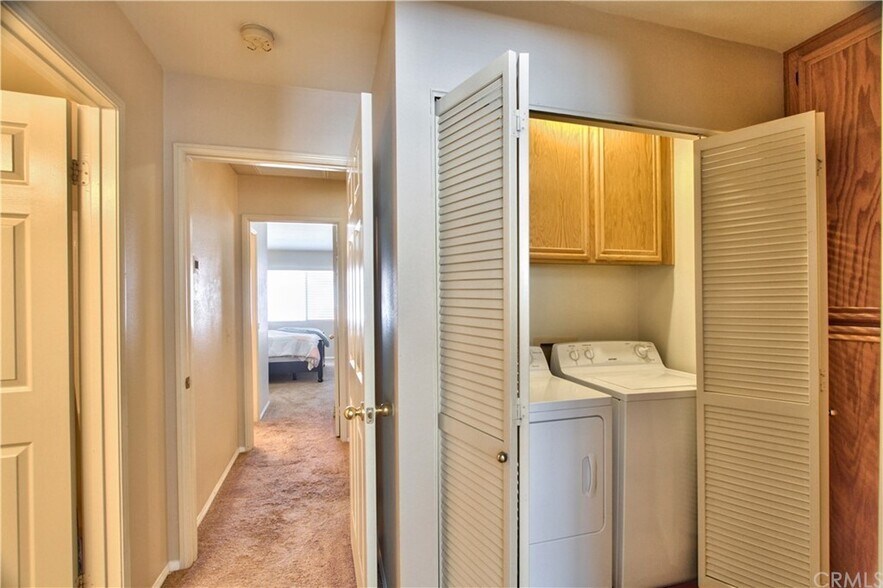 Upstairs laundry room with full size washer and dryer - 29509 Cara Way