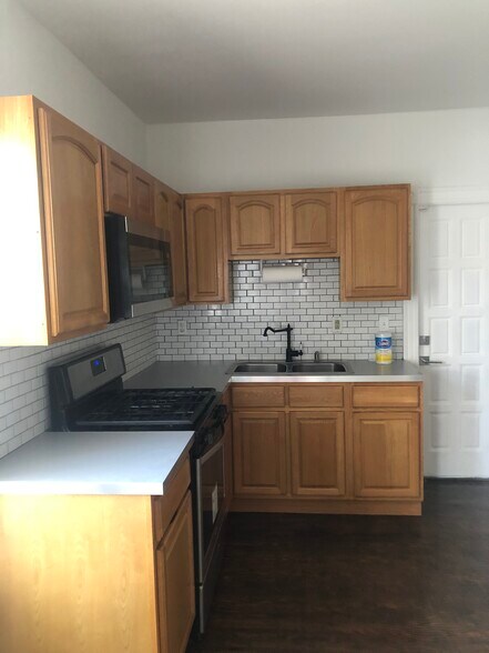 Kitchen and back entrance - 65 Rowe Ave