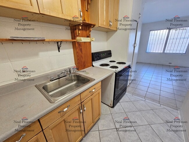 Building Photo - Studio/1 Bathroom Condo. 1 Assigned parking.