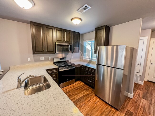 Building Photo - Charming Newer Construction Townhome-Move ...