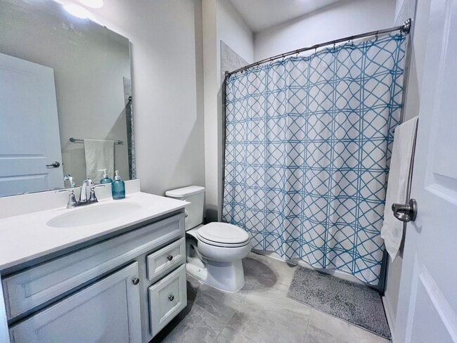 Building Photo - MINUTES TO VRE AND ALL THE CONVENIENCES OF...