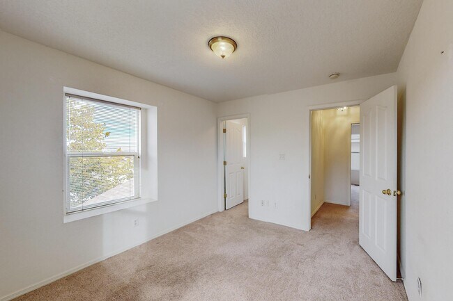 Building Photo - 6056 Malpais Park Ave NW