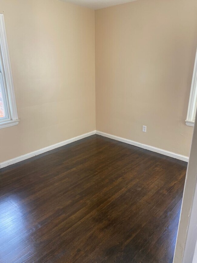 Building Photo - Three bedroom 1 bath bungalow with finished basement and 2 car garage