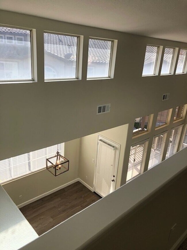 Building Photo - PICTURE PERFECT 2 BR/2 BATH PLUS LOFT END UNIT CONDO WITH DIRECT ACCESS 2 CAR GARAGE