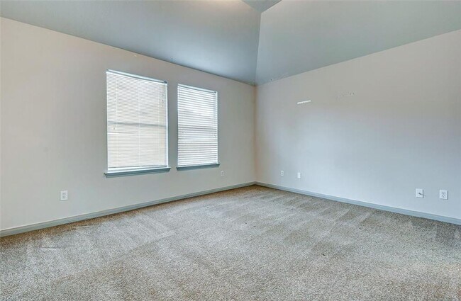 Building Photo - This one-story, three-bedroom, two bath ho...