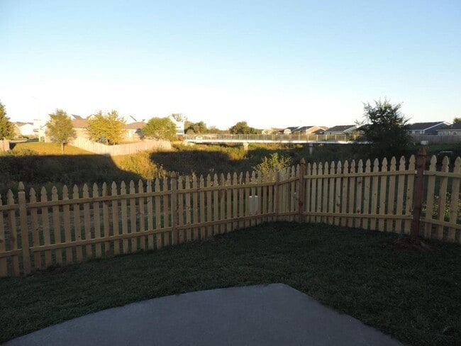 Building Photo - UPDATED KITCHEN! NEW PAINT! FENCED BACKYARD!