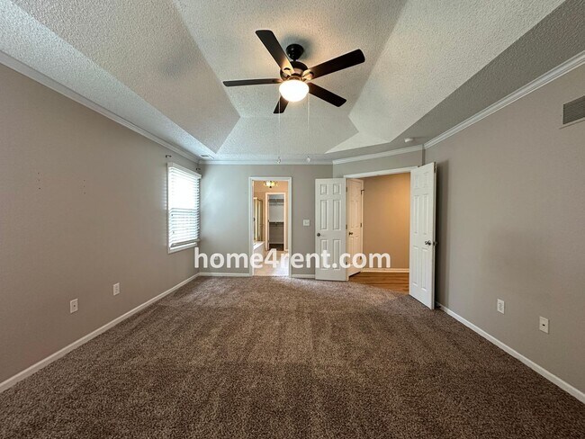 Building Photo - Updated Kitchen, Large Two Tiered Deck, Finished Basement in Blue Valley Schools!
