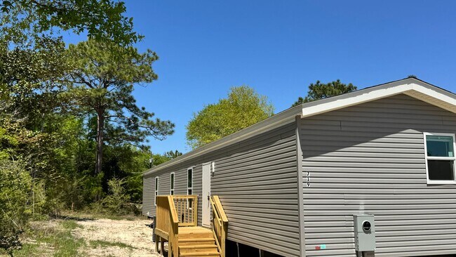Building Photo - 719 Windflower St