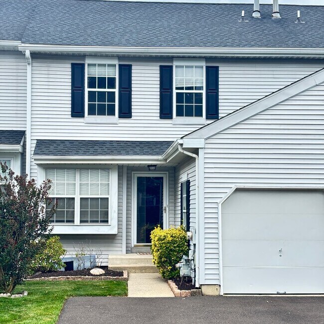 Building Photo - Spacious 3-Bedroom, 3-Bathroom Townhome with Finished Basement, Garage & Fenced Yard