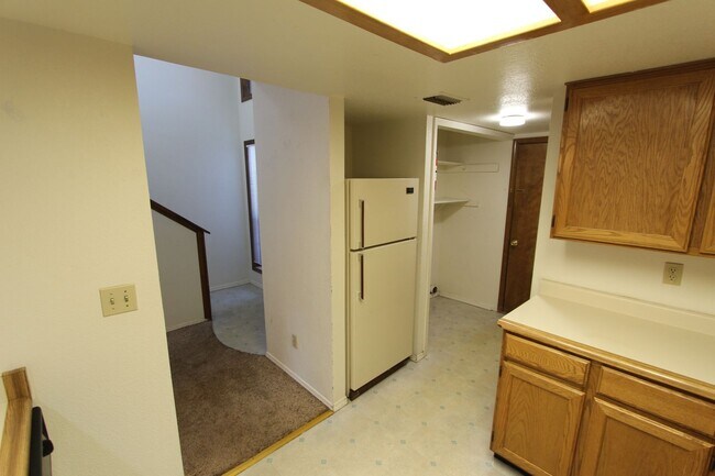 Building Photo - Bright 2BR Townhome in Boyington Heights | Private Balcony + Fenced Backyard