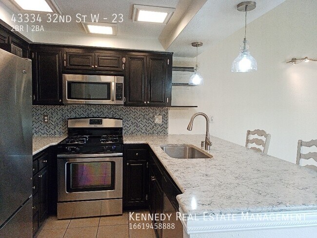 Building Photo - Spacious Single Story Condo in Gated Commu...