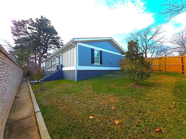 Building Photo - Lease this fully remodeled sanctuary – where modern luxury meets timeless East Texas charm!