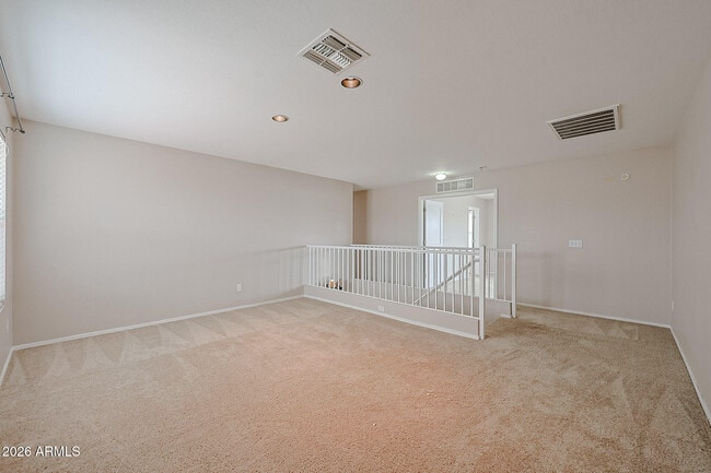 Building Photo - 15569 W Gelding Dr