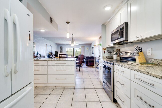 Building Photo - Wake Up to the Ocean Breeze – Your Beachsi...