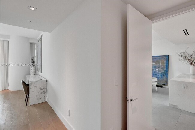 Building Photo - 10201 Collins Ave