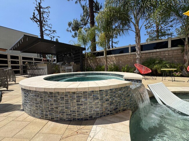 Building Photo - Luxurious Oasis with Resort-Style Pool and...